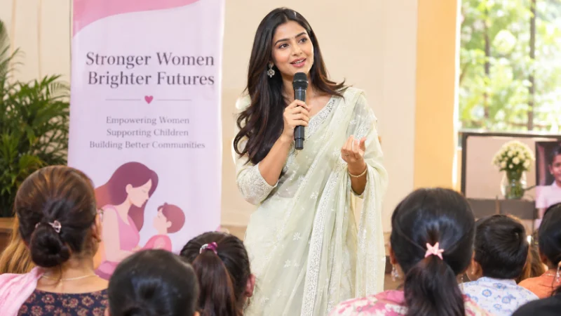 Tanya Mittal speaking at a community and philanthropy event