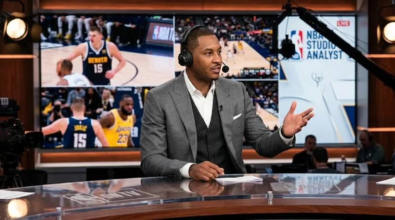 Carmelo Anthony working as an NBA studio analyst on set