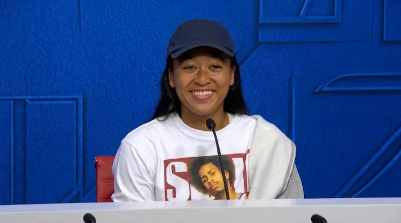 Naomi Osaka in a business meeting about her skincare and media companies